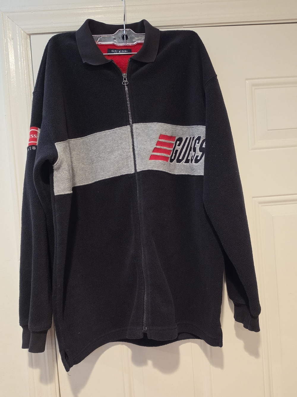 Vintage Guess Black Zip-Up Fleece Sweater with Gray Chest Stripe and Red Logo